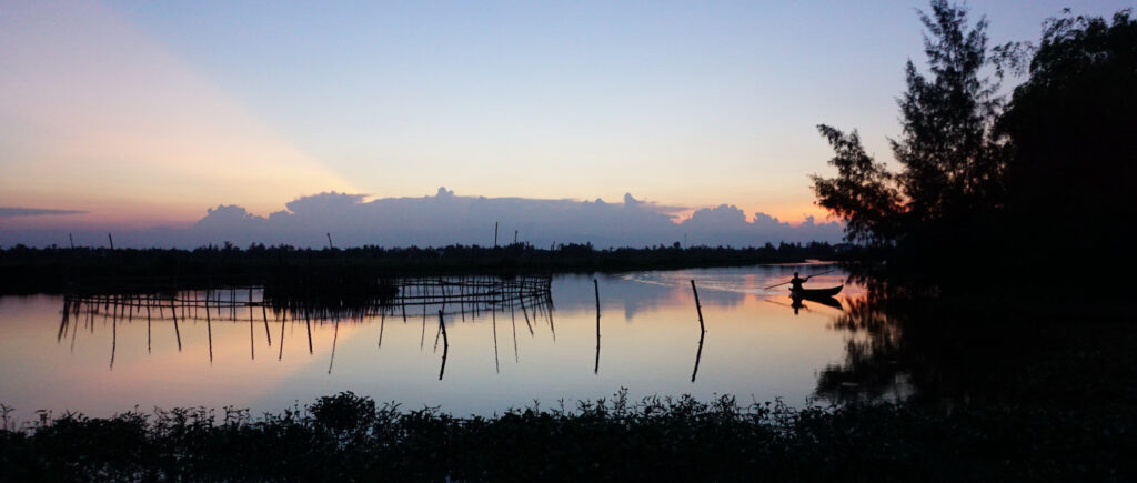 En bild på solnedgången i Hoi An
